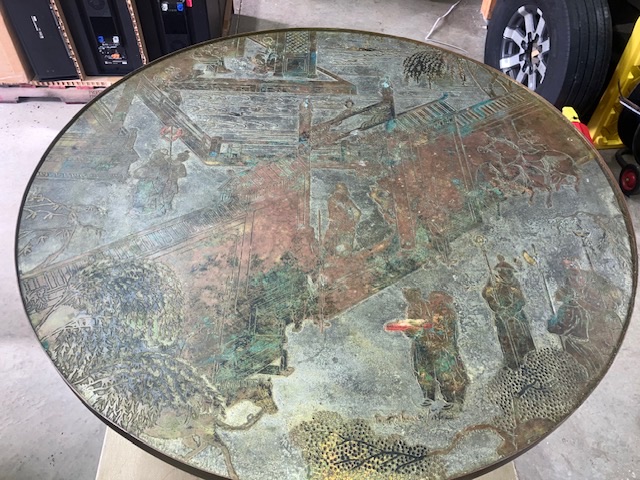 Close view of a round antique tabletop surface