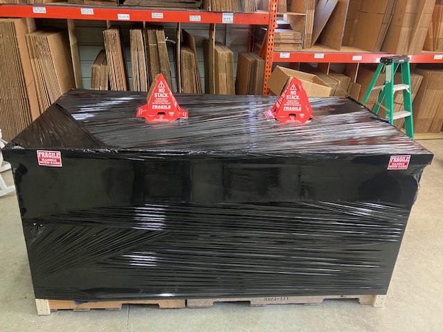 Long wrapped item prepared with handling labels