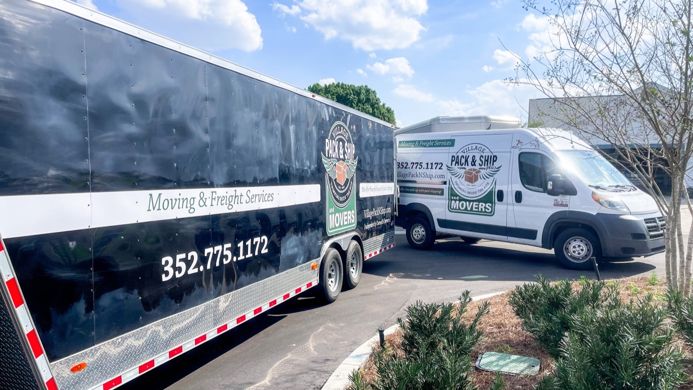 Village Pack and Ship Movers trailer showing the local moving brand