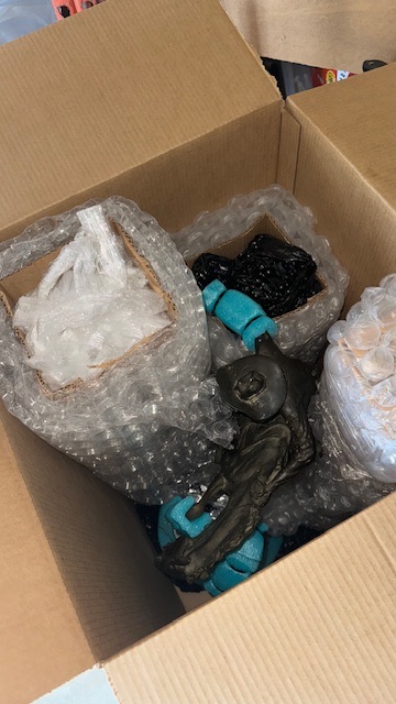 Packed household items prepared with moving supplies, example 1